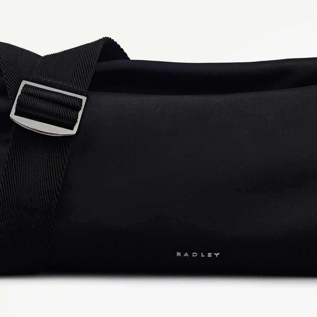 Eden Row Fabric Medium Ziptop Cross Body Bag in Black - 112321